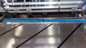 Vacuum transport belt front.